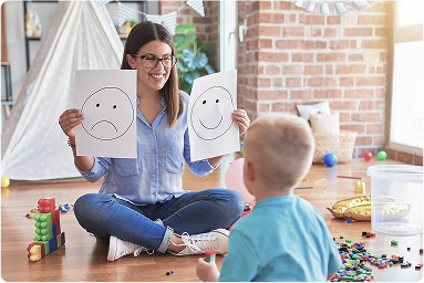 Behavior therapist helping child identify behavioral issues
