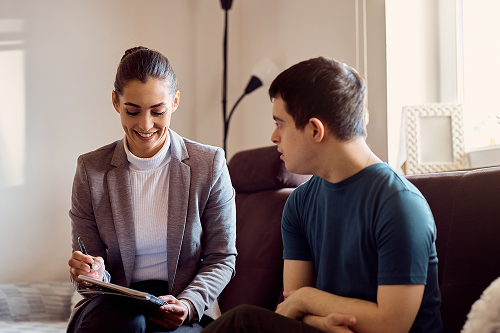 SPED service provider providing therapy to student with disability